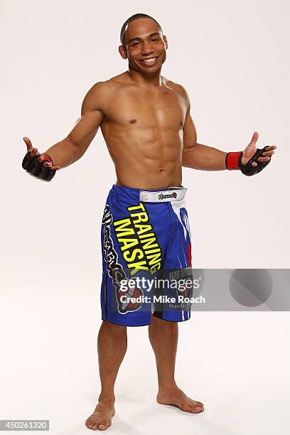 John Dodson poses for a portrait backstage after his victory over John Moraga during the UFC Fight Night event at Tingley Coliseum on June 7, 2014 in...