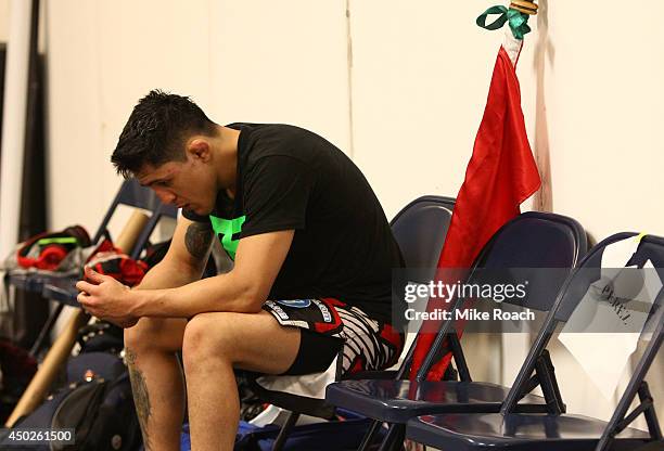 Dejected Erik Perez is seen in his locker room after his loss to Bryan Caraway during the UFC Fight Night event at Tingley Coliseum on June 7, 2014...