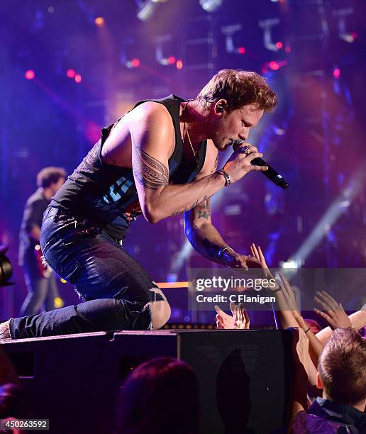 Brian Kelley of Florida Georgia Line performs during the 2014 CMA Festival at LP Field on June 7, 2014 in Nashville, Tennessee.