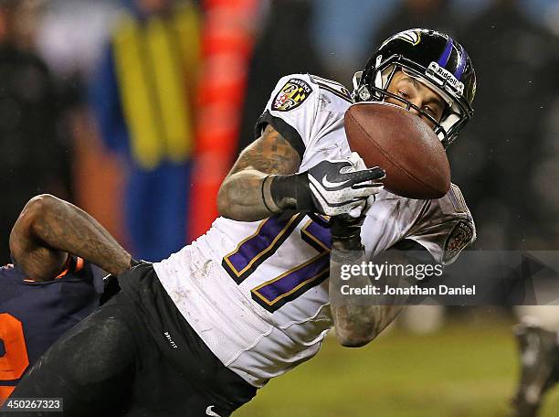 Tandon Doss of the Baltimore Ravens drops a potential first down pass in overtime against the Chicago Bears at Soldier Field on November 17, 2013 in...