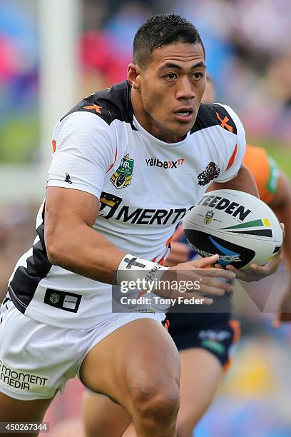 Tim Simona of the Tigers in action during the round 13 NRL match between the Newcastle Knights and the Wests Tigers at Hunter Stadium on June 8, 2014...