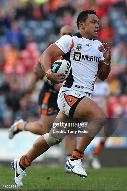 David Nofoaluma of the Tigers in action during the round 13 NRL match between the Newcastle Knights and the Wests Tigers at Hunter Stadium on June 8,...