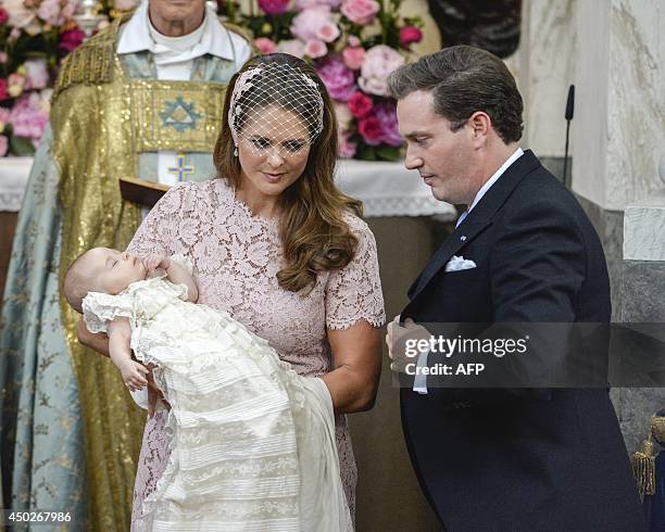 Princess Madeleine of Sweden and her husband Christopher O'Neill attend a baptism of Princess Leonore in the Drottningholm Palace church outside...