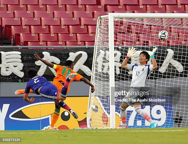 Shusaku Nishikawa of Japan fails to stop Zambia's first goal during the international friendly match between Japan and Zambia at Raymond James...