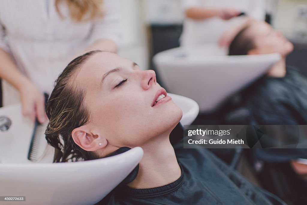 Woman enjoying hair wash