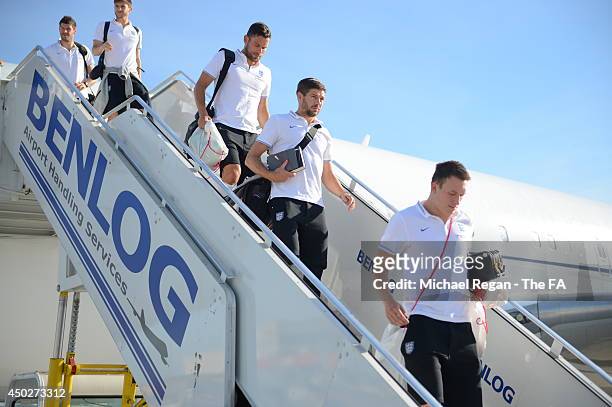 Phil Jones, Steven Gerrard and Ben Foster of England arrive into Rio de Janeiro Galeao International Airport on June 8, 2014 in Rio de Janeiro,...