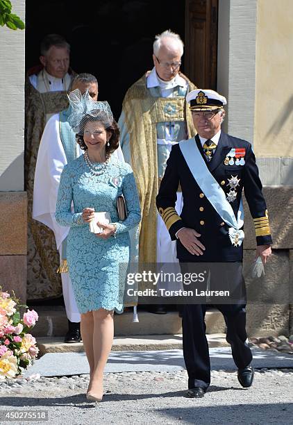 Queen Silvia of Sweden and King Carl Gustaf of Sweden arrive for Princess Leonore's Royal Christening at Drottningholm Palace Chapel on June 8, 2014...