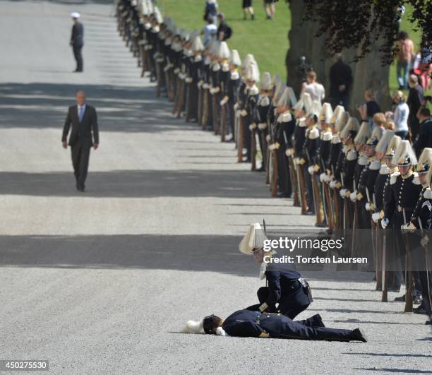 Swedish Royal Guard collapses during Princess Leonore's Royal Christening at Drottningholm Palace Chapel on June 8, 2014 in Stockholm, Sweden.