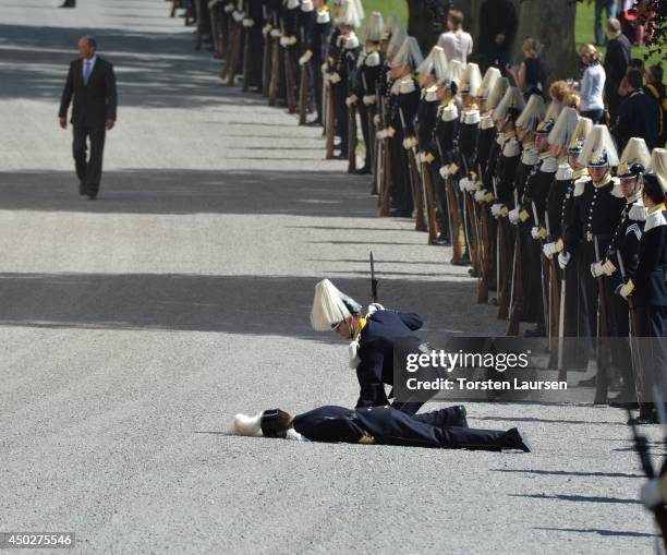 Swedish Royal Guard collapses during Princess Leonore's Royal Christening at Drottningholm Palace Chapel on June 8, 2014 in Stockholm, Sweden.