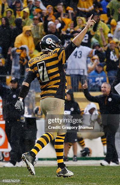 Ben Roethlisberger of the Pittsburgh Steelers reacts after throwing a fourth quarter touchdown to Will Johnson while playing the Detroit Lions at...