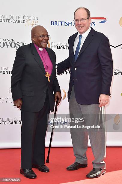 Desmond Tutu and Prince Albert II of Monaco attend a photocall during the 54th Monte-Carlo Television Festival at Grimaldi Forum on June 8, 2014 in...