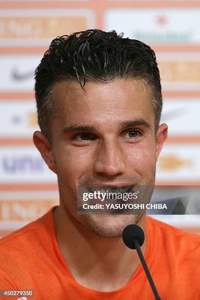 Netherlands' Robin van Persie speaks to the media after their training session in Rio de Janeiro, Brazil on June 8 in preparation for the upcoming...