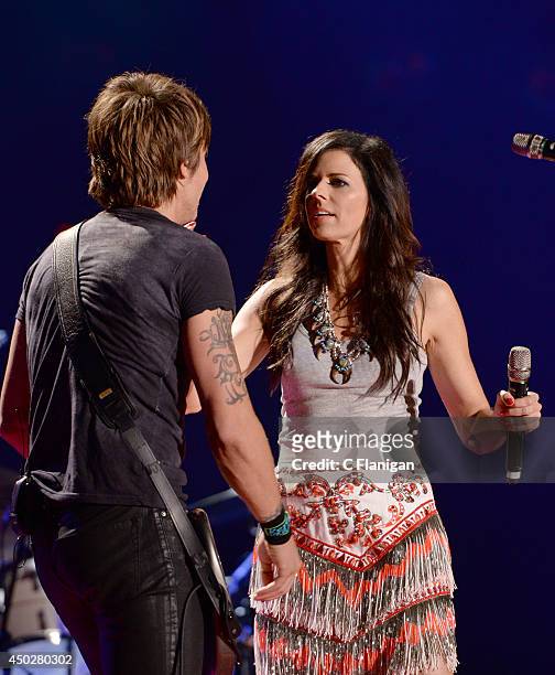 Karen Fairchild of Little Big Town performs as a special guest with Keith Urban during the 2014 CMA Festival at LP Field on June 7, 2014 in...