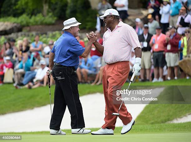 Jim Thorpe and Jim Colbert celebrate after winning the Legends division of the Big Cedar Lodge Legends of Golf presented by Bass Pro Shops at Top of...