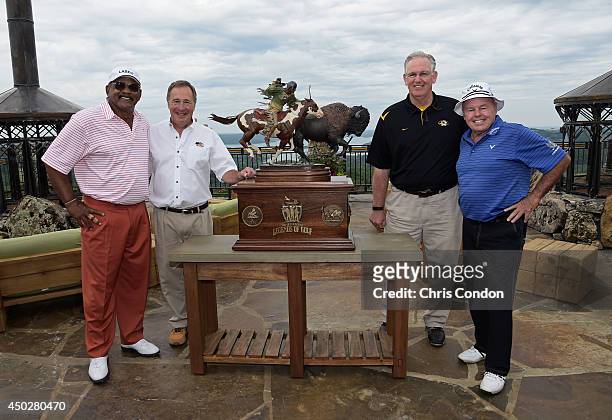 Jim Thorpe, John Morris, Missouri Governor Jay Nixon and Jim Colbert pose with the Legends trophy after Thorpe and Colbert win the Legends division...