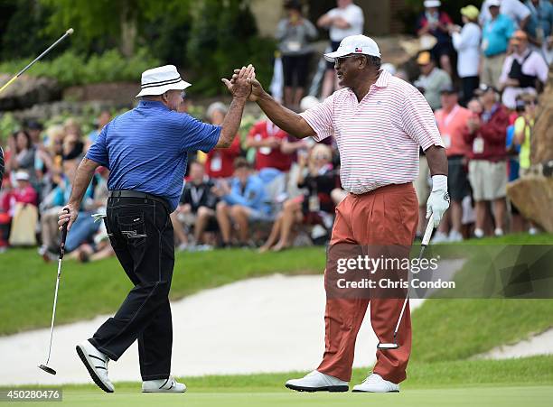 Jim Thorpe and Jim Colbert celebrate after winning the Legends division of the Big Cedar Lodge Legends of Golf presented by Bass Pro Shops at Top of...