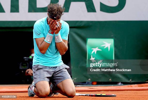 Rafael Nadal of Spain celebrates match point during his men's singles final match against Novak Djokovic of Serbia on day fifteen of the French Open...