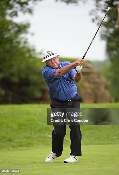 Jim Colbert tees off on the 3rd hole while competing in the final round of the Legends division of the Big Cedar Lodge Legends of Golf presented by...