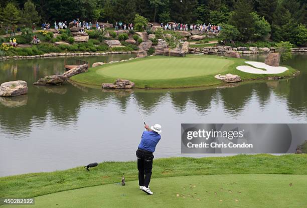 Jim Colbert tees off on the 6th hole while competing in the final round of the Legends division of the Big Cedar Lodge Legends of Golf presented by...