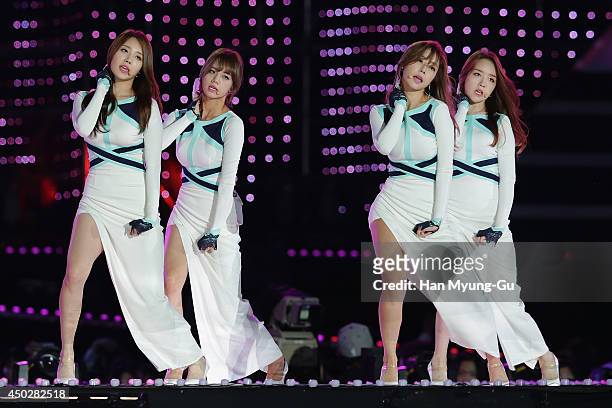 Members of South Korean girl group Girl's Day perform on stage during the 20th Dream Concert on June 7, 2014 in Seoul, South Korea.