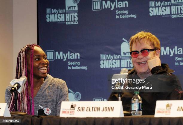 Tennis player Venus Williams and singer Sir Elton John smile during the press conference for Mylan World TeamTennis at ESPN Wide World of Sports...