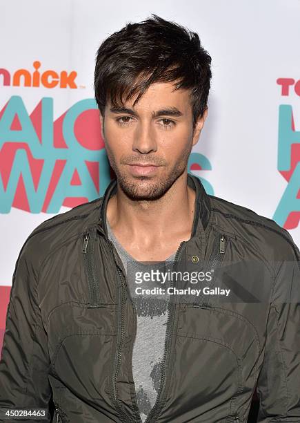 Singer Enrique Iglesias arrives at the 5th Annual TeenNick HALO Awards at Hollywood Palladium on November 17, 2013 in Hollywood, California.