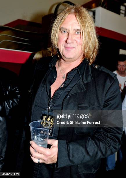 Joe Elliott of Def Leppard attends Mott The Hoople performing on stage at Apollo on November 17, 2013 in Manchester, United Kingdom.