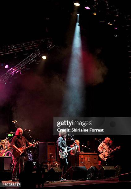 Ian Hunter, Pete Overend Watts, Mick Ralphs, Martin Chambers and Verden Allen of Mott The Hoople perform on stage at Apollo on November 17, 2013 in...