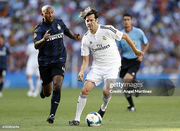 Santiago Solari of Real Madrid Legends competes for the ball with Olivier Dacourt of Inter Forever during the Corazon Classic match between Real...