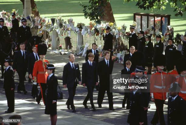 Funeral of Diana, Princess of Wales - L-R Prince Prince Philip William, Earl Spencer and Prince Harry walk behind the Gun Carriage carrying the...