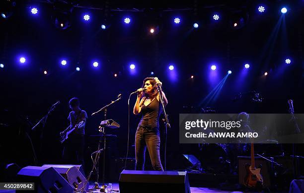 Lebanese singer Yasmine Hamdan performs on stage during a concert at the Music Hall in Beirut on June 8, 2014. Hamdan was casted in Jim Jarmusch's...