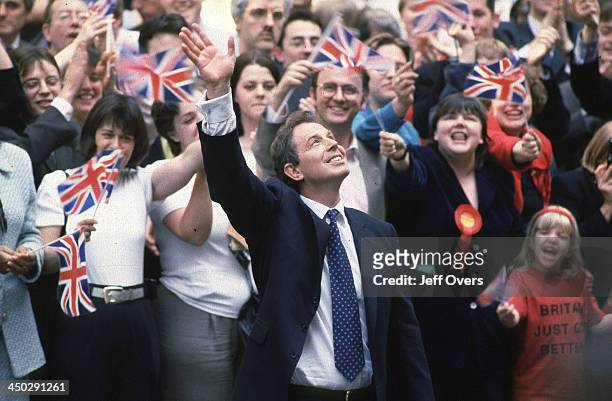 Tony Blair arriving in Downing Street after Election Victory, London with crowds waiving flags in the background, 2nd May 1997.