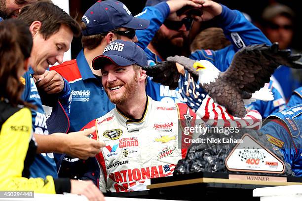 Dale Earnhardt Jr., driver of the National Guard Chevrolet, shares a smile in Victory Lane with Steve Letarte, crew chief of the National Guard...