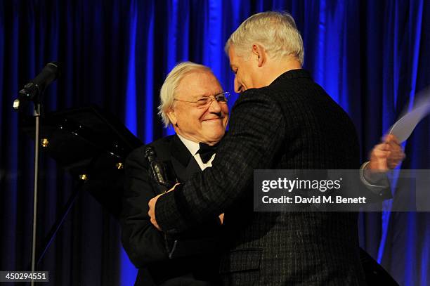 Roger Wright , Director of BBC Proms, accepts the Beyond Theatre award for the 2013 season of the BBC Proms from Sir David Attenborough at the 59th...