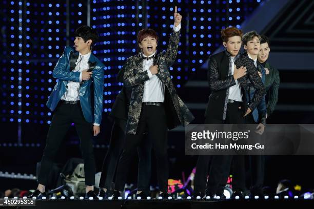 Members of South Korean boy band U-Kiss perform on stage during the 20th Dream Concert on June 7, 2014 in Seoul, South Korea.