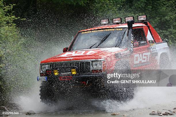 Four-wheel drive car competes during the tenth Albania's Rally near the village of Petrela on June 8, 2014. Over 170 contestants from 23...