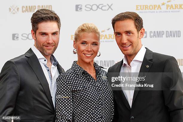 Christian Polanc, Tanja Schewtschenko and Marcel Remus attend the 'Fashion World Camp David und Soccx' Store Opening on June 08, 2014 in Rust,...