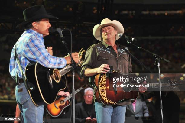 Musicians Alan Jackson performs "Amarillo By Morning" and "Murder On Music Row" with George Strait onstage at George Strait's 'The Cowboy Rides Away...