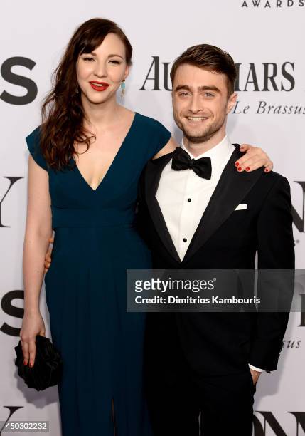 Erin Darke and Daniel Radcliffe attend the 68th Annual Tony Awards at Radio City Music Hall on June 8, 2014 in New York City.