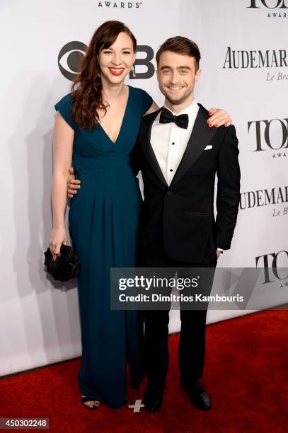 Erin Darke and Daniel Radcliffe attend the 68th Annual Tony Awards at Radio City Music Hall on June 8, 2014 in New York City.