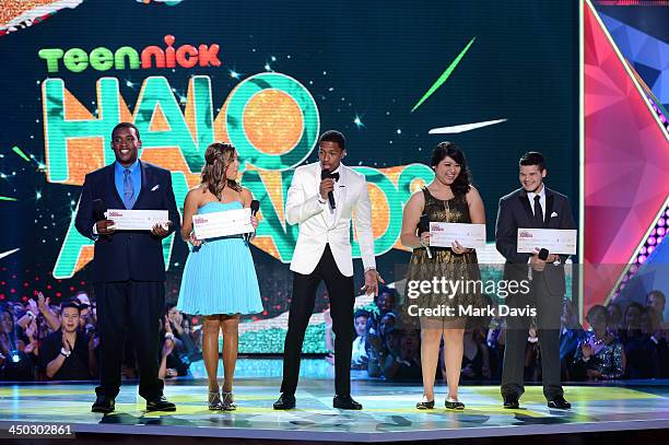 Host Nick Cannon with honorees Denzel Thompson, Miranda Fuentes, Rocio Ortega, and Zachary Kerr onstage during the 5th Annual TeenNick HALO Awards at...