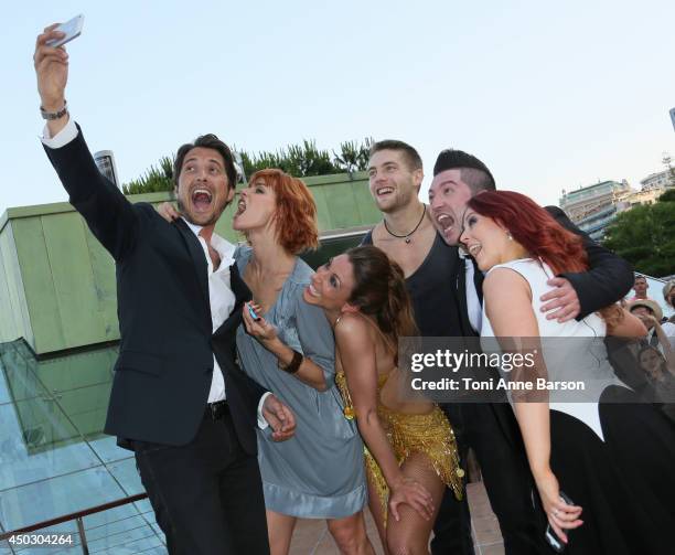 Vincent Cerutti takes a selfie with Fauve Hautot, Yann-Alrick, Silvia Notargiacomo, Jaclyn Spencer, Chris Marques and Sandrine Quetier after they...