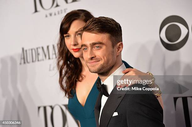 Daniel Radcliffe and Erin Darke attend the 68th Annual Tony Awards at Radio City Music Hall on June 8, 2014 in New York City.