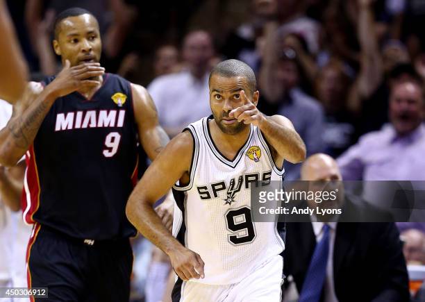 Tony Parker of the San Antonio Spurs reacts after hitting a shot against the Miami Heat during Game Two of the 2014 NBA Finals at the AT&T Center on...