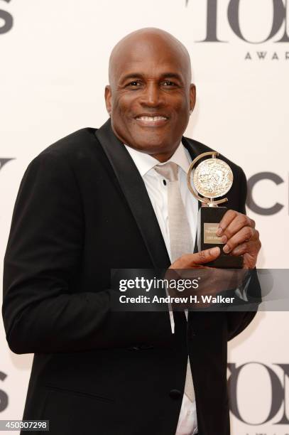 Kenny Leon winner of the award for Best Direction of a Play for A Raisin in the Sun poses in the press room during the 68th Annual Tony Awards on...