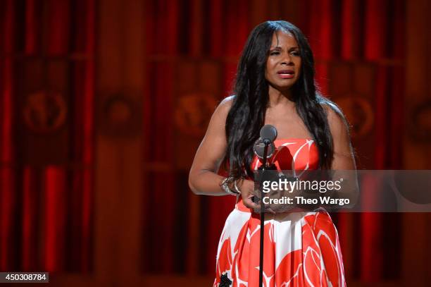 Audra McDonald accepts the award for Best Performance by an Actress in a Leading Role in a Play for Lady Day onstage during the 68th Annual Tony...