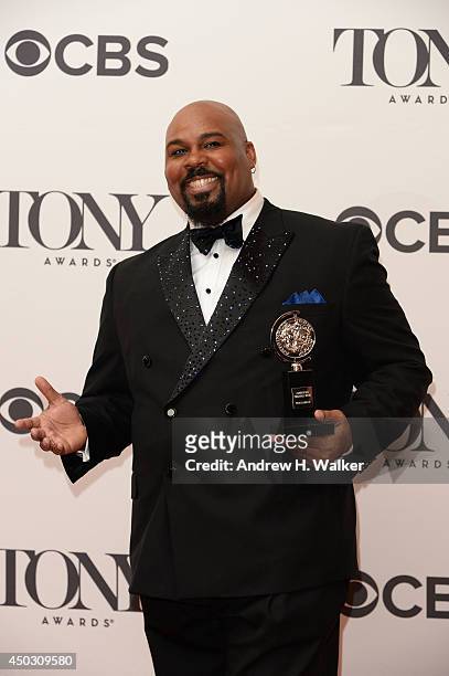 Actor James Monroe Iglehart, winner of the Tony Award for the Best Performance by an Actor in a Featured Role in a Musical for "Aladdin" poses in the...