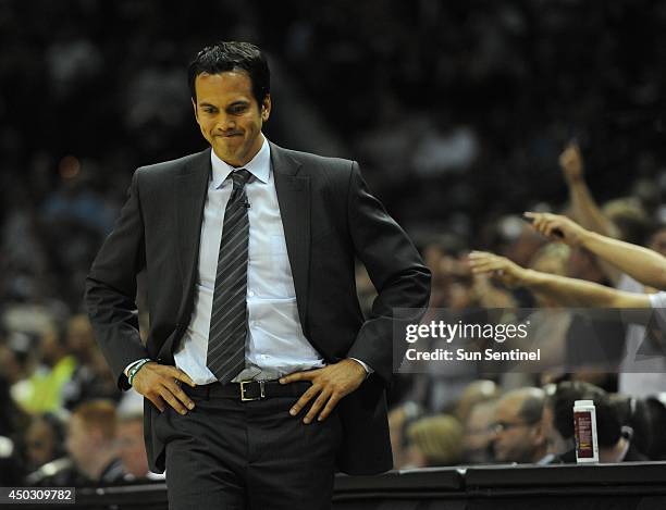 Miami Heat coach Erik Spoelstra is unhappy as his team commits a turnover against the San Antonio Spurs during Game 2 of the NBA Finals at the AT&T...