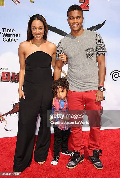 Actress Tia Mowry, actor Cory Hardrict and son Cree Taylor Hardrict attend the premiere of "How To Train Your Dragon 2" at Regency Village Theatre on...