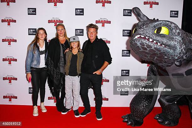 Wayne Cooper ,Sarah Marsh and family attend the 'How To Train Your Dragon 2' Australian premiere at Event Cinemas George Street on June 9, 2014 in...